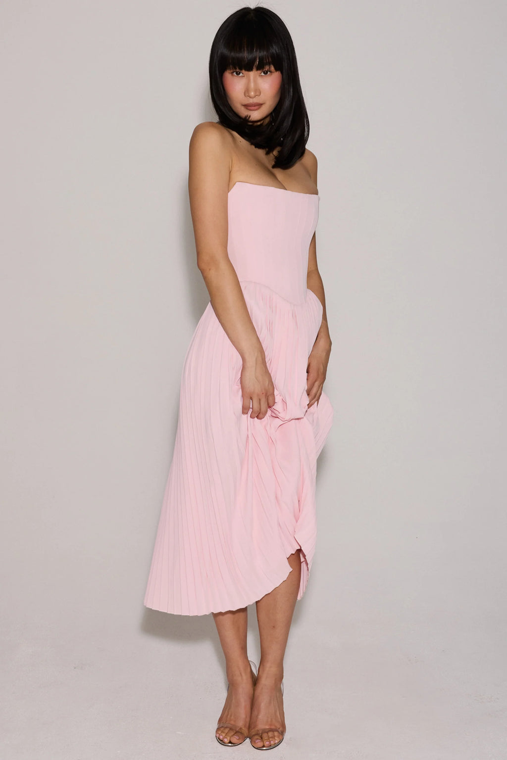 pink pleated midi corset dress